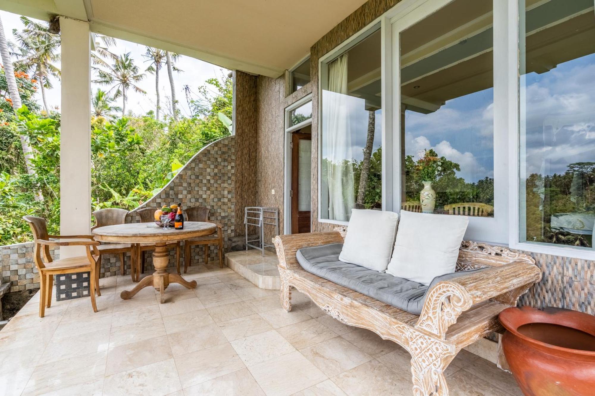 Tirta Asri Ubud Villa Quarto foto
